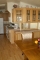 Large counters and cabinets, double sink, full stove and oven, refrigerator, built-in microwave, and dishwasher.